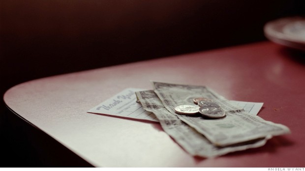 Tip and receipt on table in restaurant