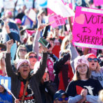 LAS VEGAS, NV - JANUARY 21:  Attendees cheer a speaker during the Women's March "Power to the Polls" voter registration tour launch at Sam Boyd Stadium on January 21, 2018, in Las Vegas, Nevada. Demonstrators across the nation gathered over the weekend, one year after the historic Women's March on Washington, D.C., to protest President Donald Trump's administration and to raise awareness for women's issues.  (Photo by Sam Morris/Getty Images)