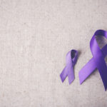 Purple ribbons toning copy space background, Alzheimer's disease, Pancreatic cancer, Epilepsy awareness, Hodgkin's Lymphoma awareness